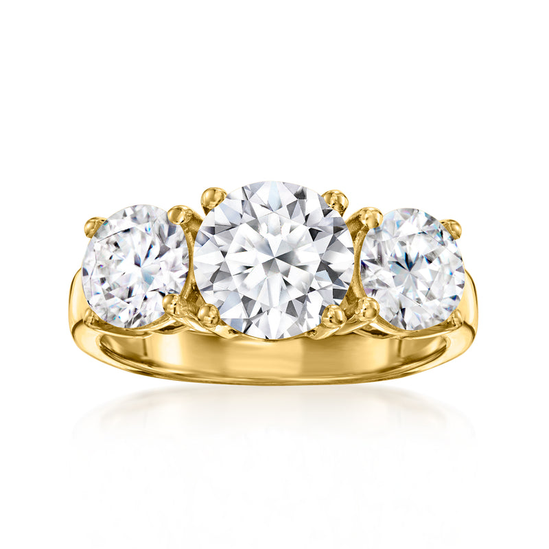 Three-stone lab-grown diamond ring in 14k yellow gold, round center with two side stones