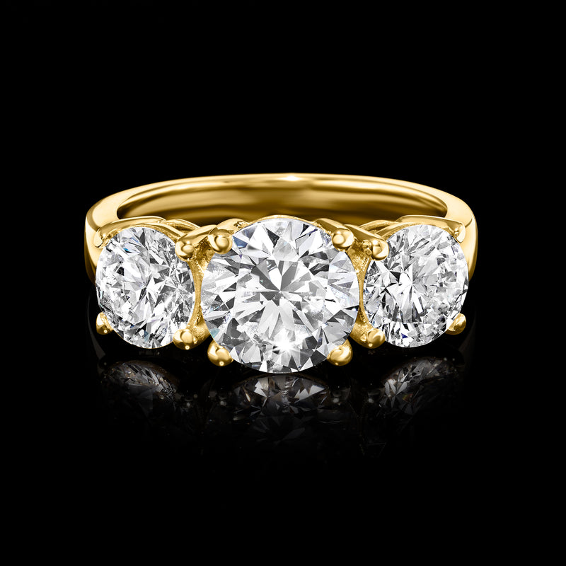 Three-stone lab-grown diamond ring in 14k yellow gold, round diamonds in prong settings