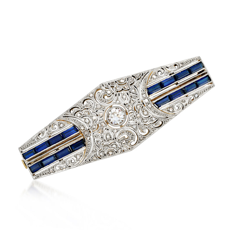 Vintage filigree sapphire and diamond bar pin with blue baguette stones, platinum setting
