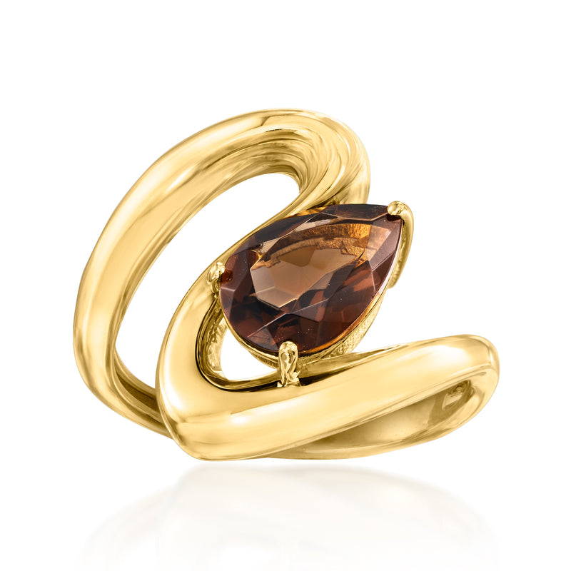 Gold swirl ring with oval smoky quartz gemstone in a raised bezel setting