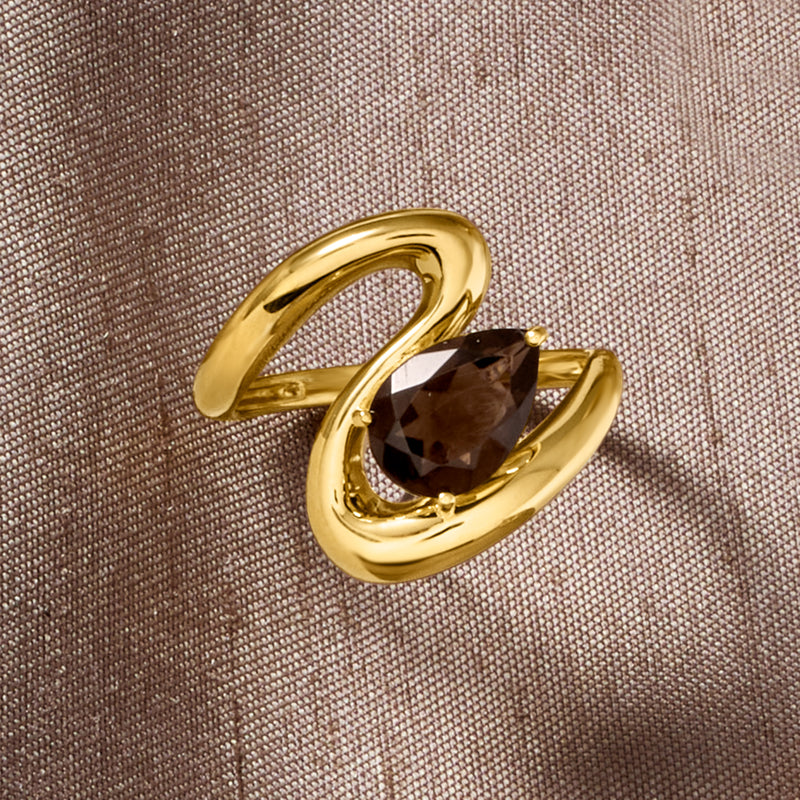Smoky quartz teardrop ring with gold swirl shoulders and bezel-set stone