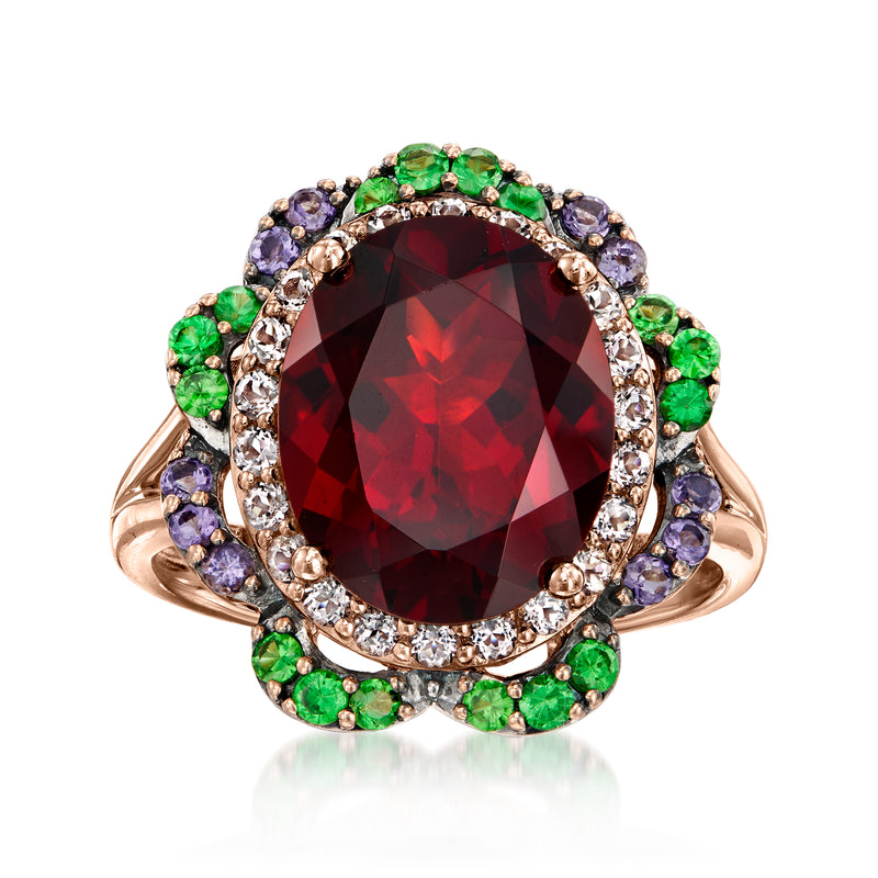 Vintage oval red gemstone ring in rose gold with diamonds, green and purple accents