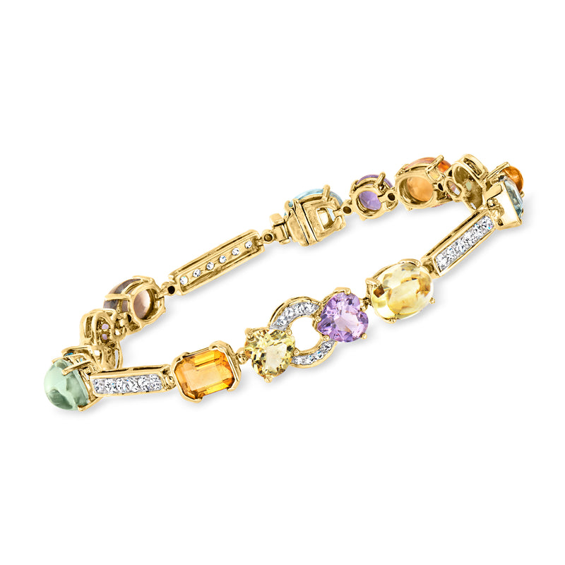 Vintage yellow gold multi-gemstone bracelet with oval and round stones and diamond accents