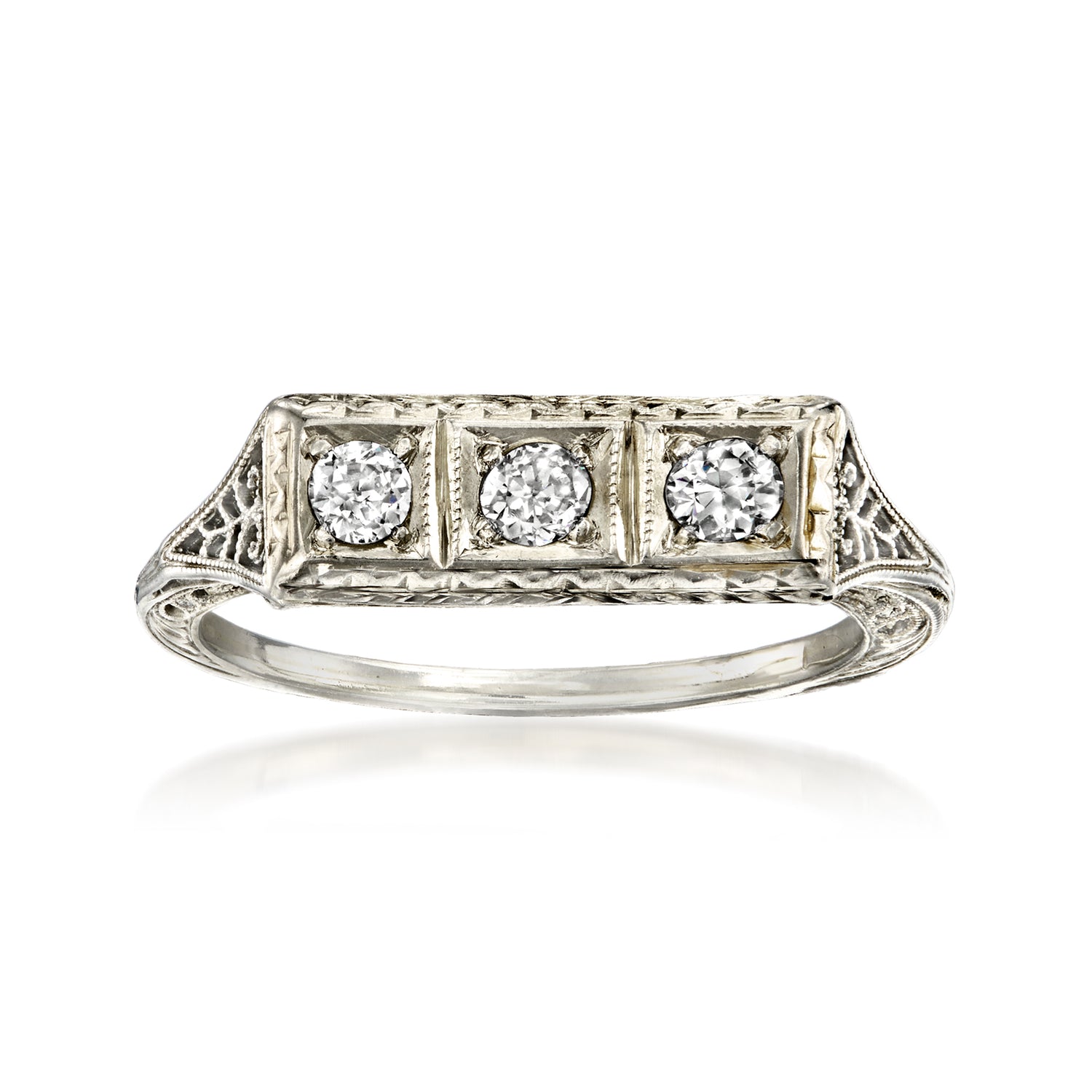 C. 1980 Vintage .10 ct. t.w. Diamond Three-Stone Ring in 18kt White Gold