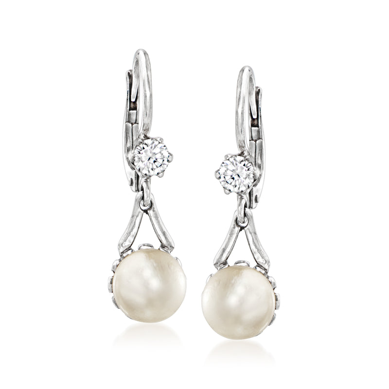 18kt white gold leverback drop earrings with round cultured pearl and small diamond