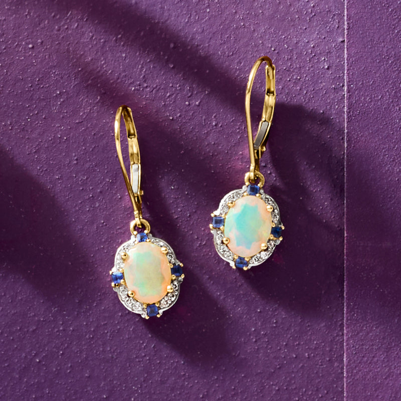Yellow gold leverback drop earrings with opal center, sapphire accents and diamond halo