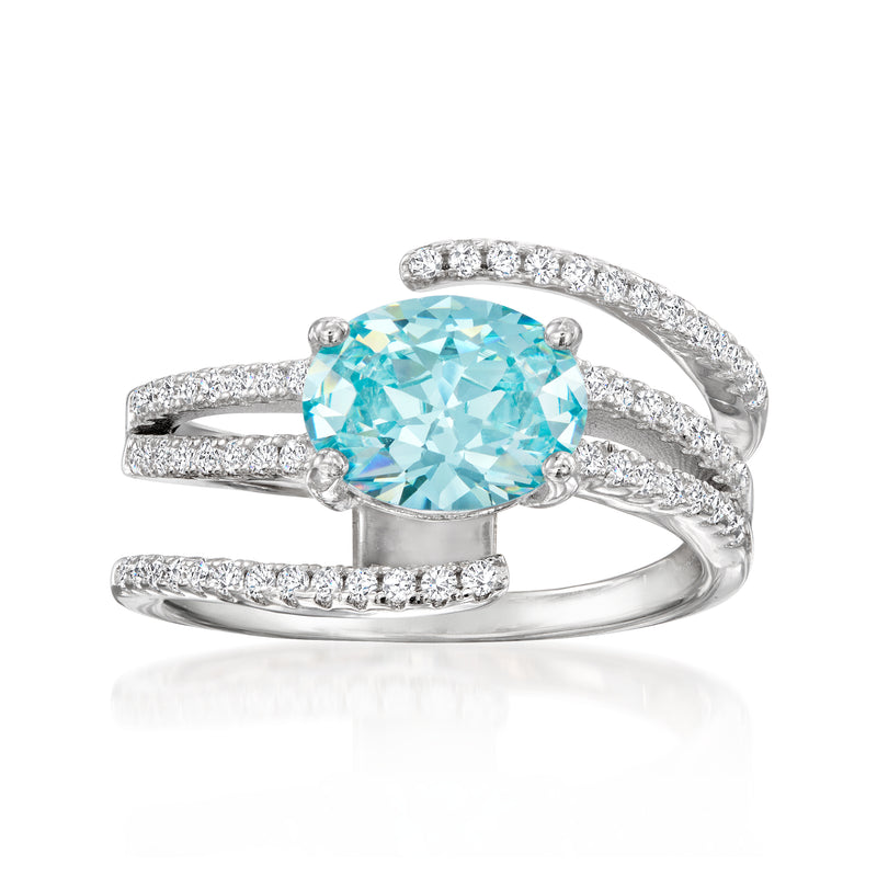 Sterling silver simulated aquamarine spiral ring with round blue stone and CZ accents