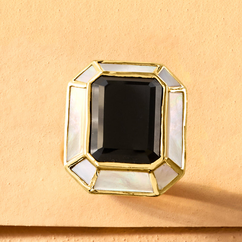 Gold over sterling onyx ring with octagonal black stone and mother-of-pearl prong details