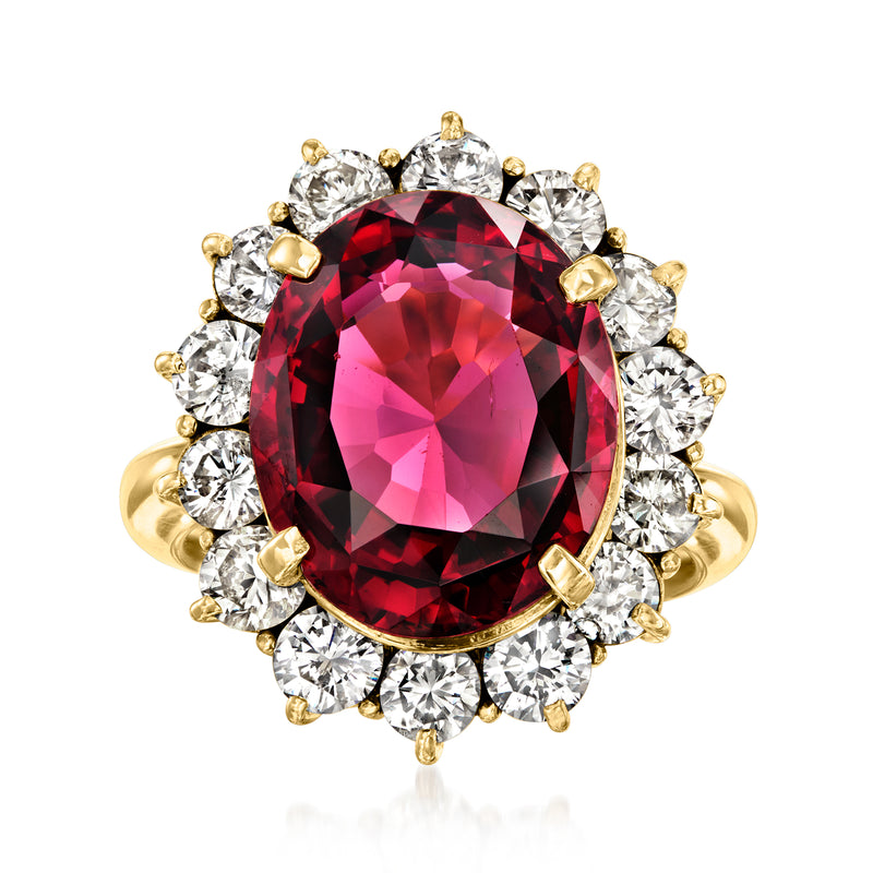 Oval rhodolite garnet ring with diamond halo and 18k yellow gold band