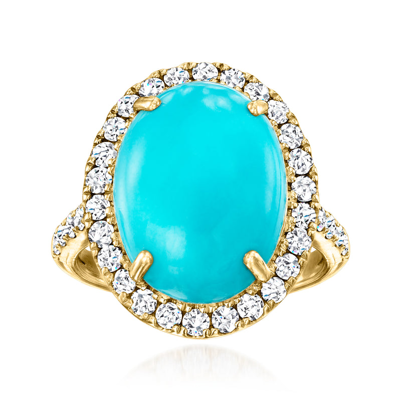 Vintage turquoise oval ring with diamond halo in 14kt yellow gold, openwork band