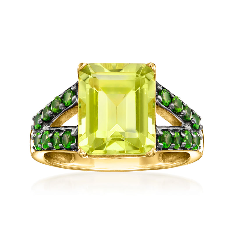Gold ring with large lemon-yellow square gemstone and green side stones