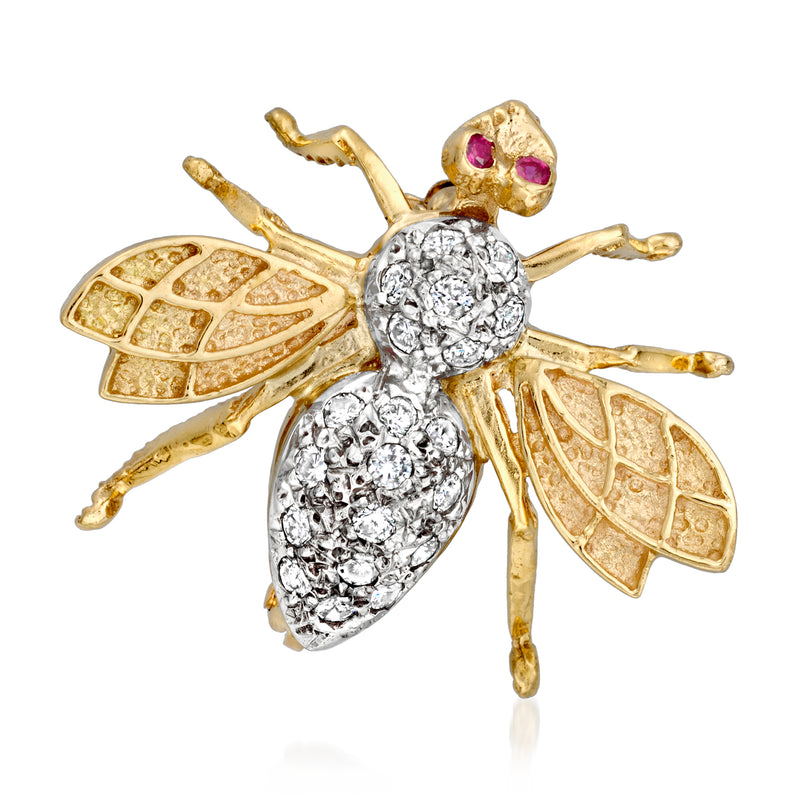 Vintage two-tone gold bumblebee pin with diamond body and ruby eyes, detailed wings