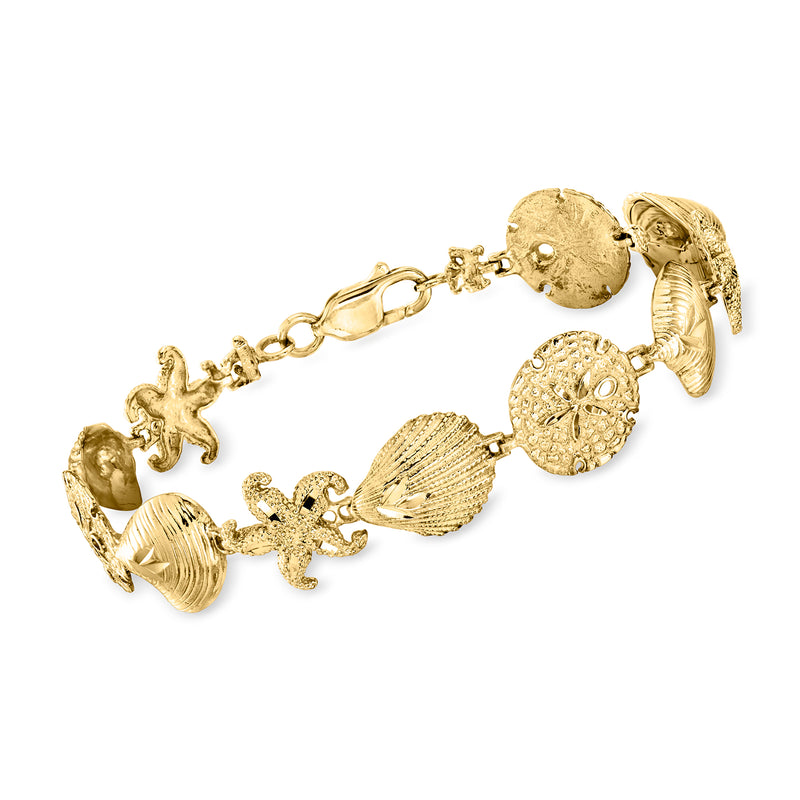 Vintage 14k yellow gold sea life bracelet with shell and fish charms