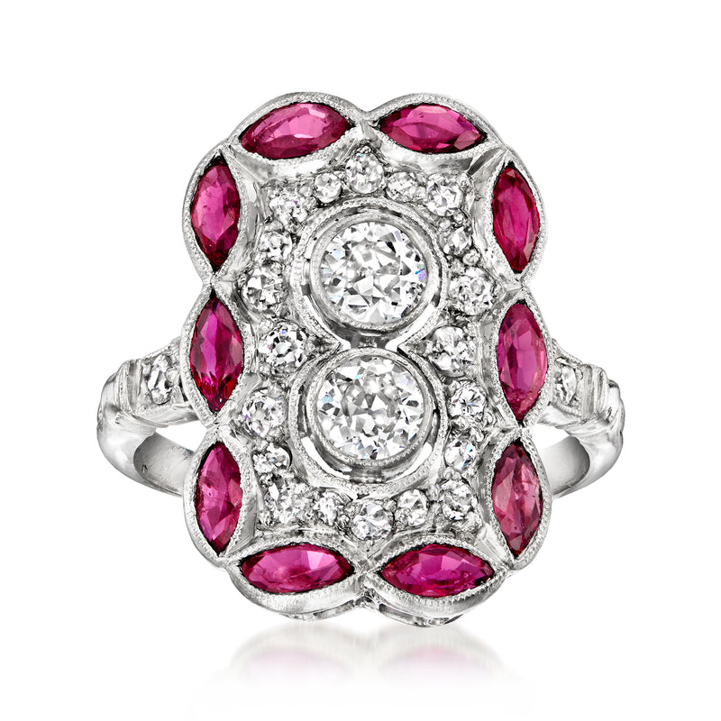 Platinum vintage cluster ring with round diamonds and pink oval ruby accents