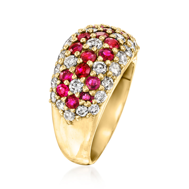 Yellow gold cluster flower ring with ruby-red gemstones and white diamond halo detail