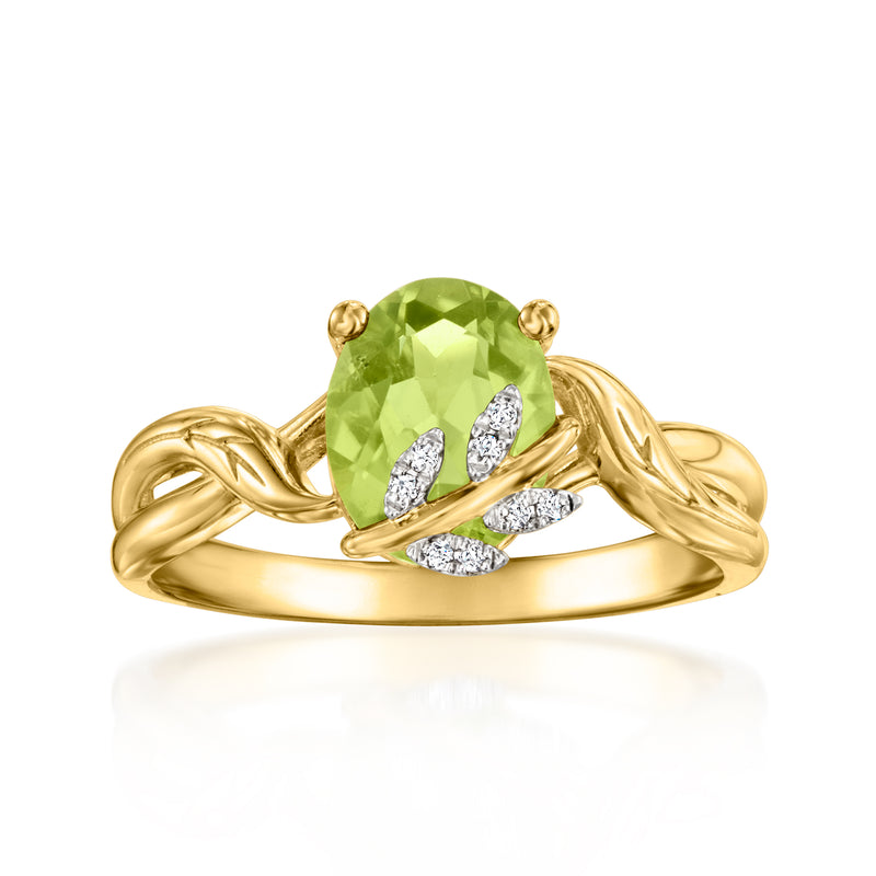 Gold leaf ring with large green peridot and five white diamond accents