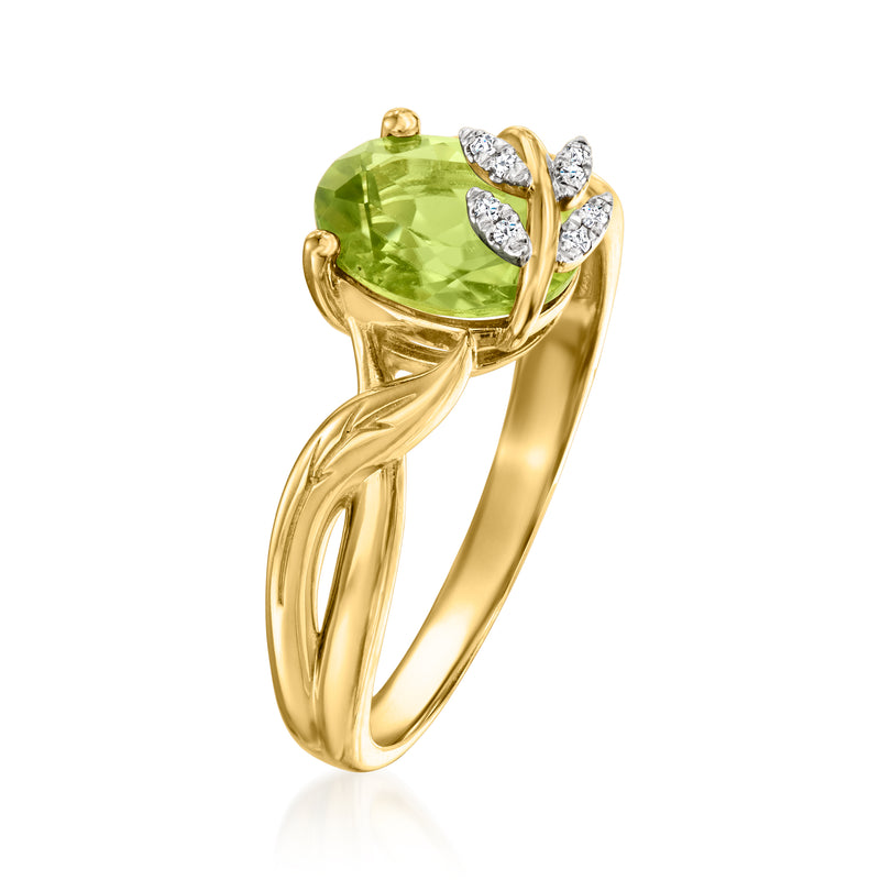 Gold leaf ring with green oval peridot center and diamond cluster top