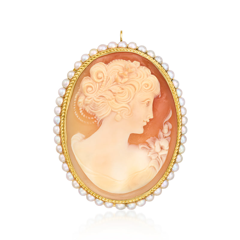 Oval shell cameo pin/pendant in warm amber with cultured pearl surround, gold-tone frame