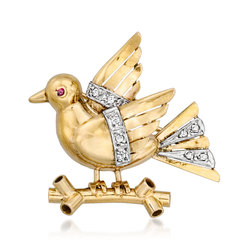 Vintage bird lapel pin in yellow gold with diamond accents and red stone