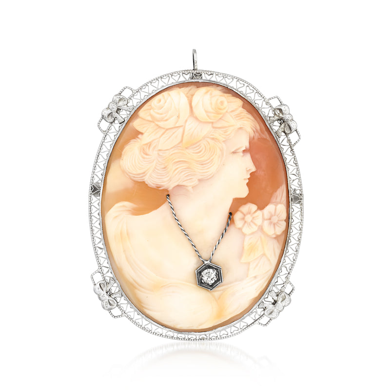 Oval shell cameo pendant in white gold with portrait profile and dark diamond accent