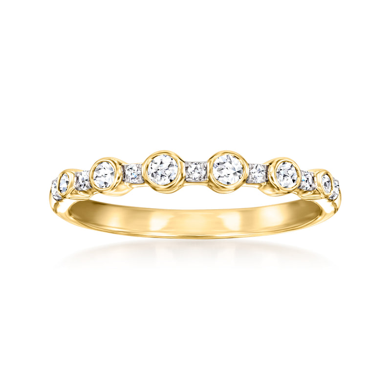 Bezel-set lab-grown diamond ring in gold with round stones along the band
