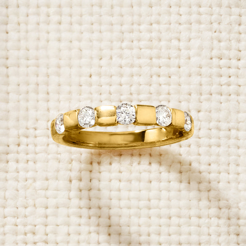 Gold-tone five-stone diamond ring, low-profile band with five round stones