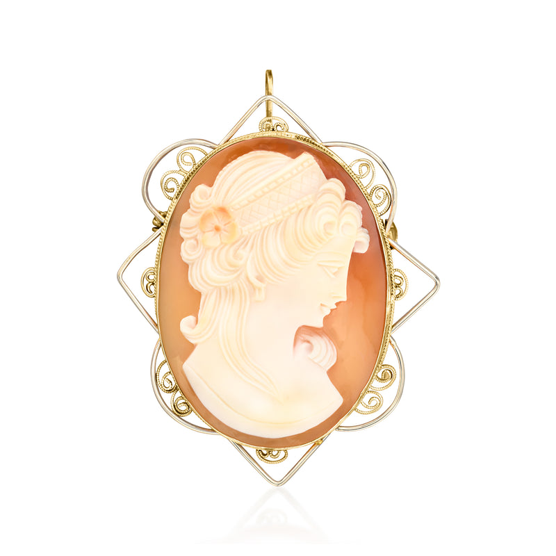Oval cameo pin pendant with white shell profile and ornate two-tone gold frame