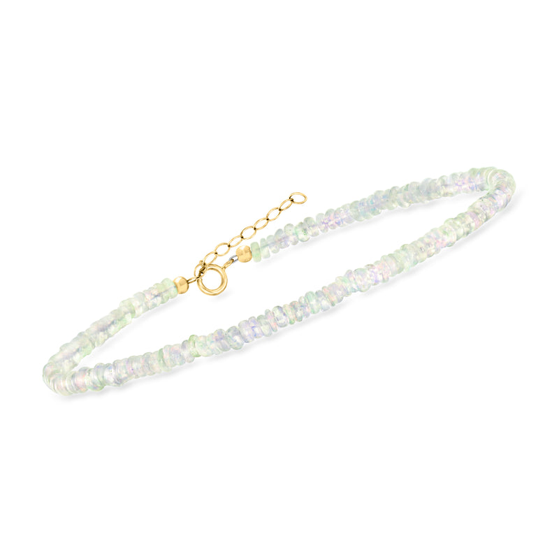 Opal bead anklet laid flat with 14kt yellow gold clasp and light iridescent beads