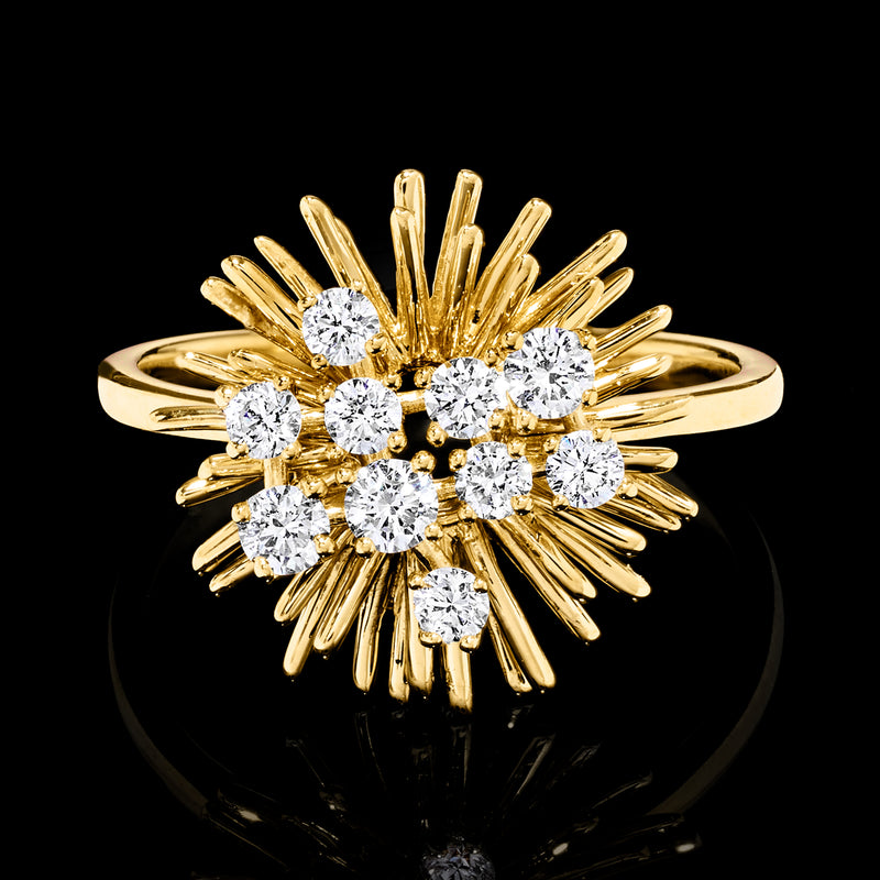Close-up gold sunburst ring with multiple round lab-grown diamonds and prong rays