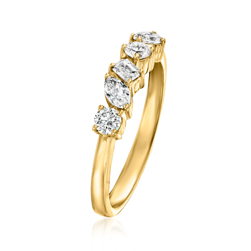 Gold ring featuring five multi-shape lab-grown diamonds on a curved band
