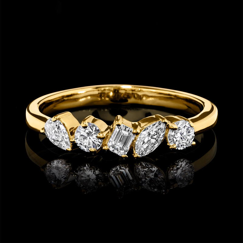 Gold band ring with five multi-shape lab-grown diamonds in prong settings