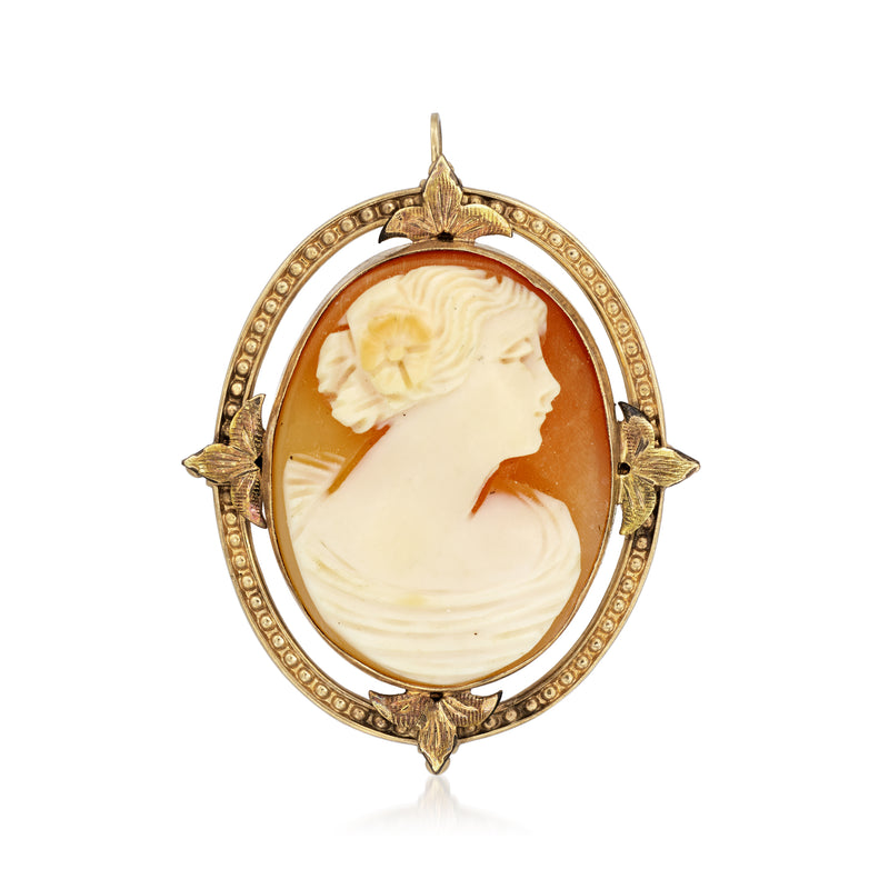 Vintage cameo pin/pendant with brown shell profile in oval 10kt yellow gold frame