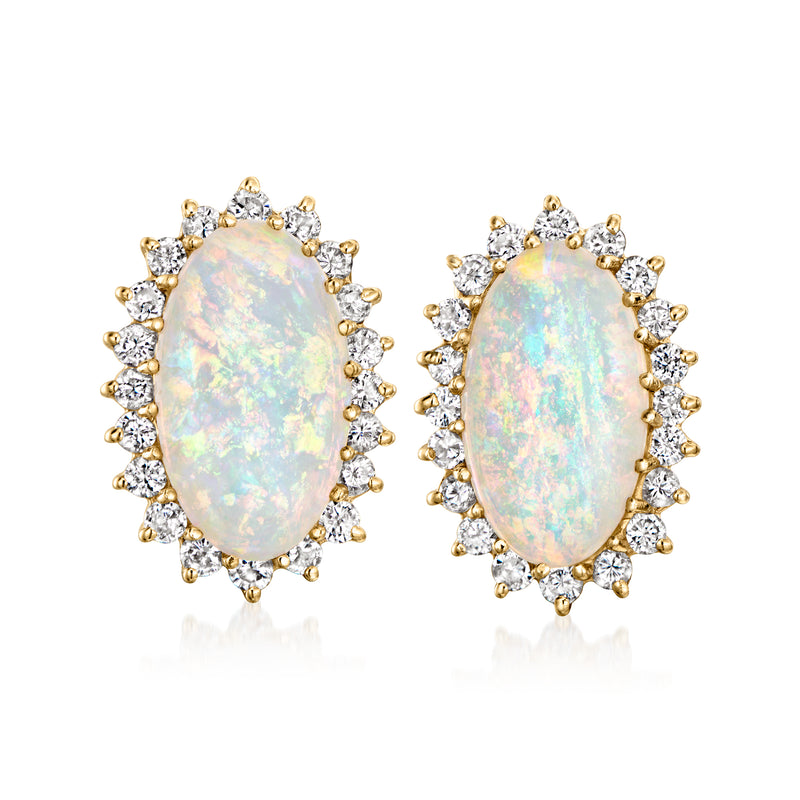 Oval opal and diamond halo stud earrings in 14kt yellow gold