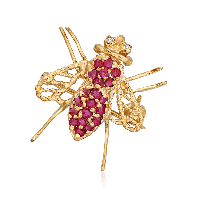 Vintage bee pin in 14kt yellow gold with ruby-red stones and diamond accents