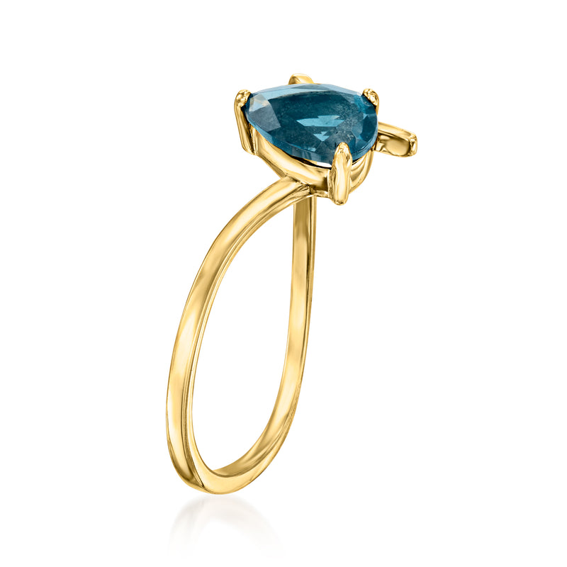 14kt yellow gold ring with oval London blue topaz and prong halo