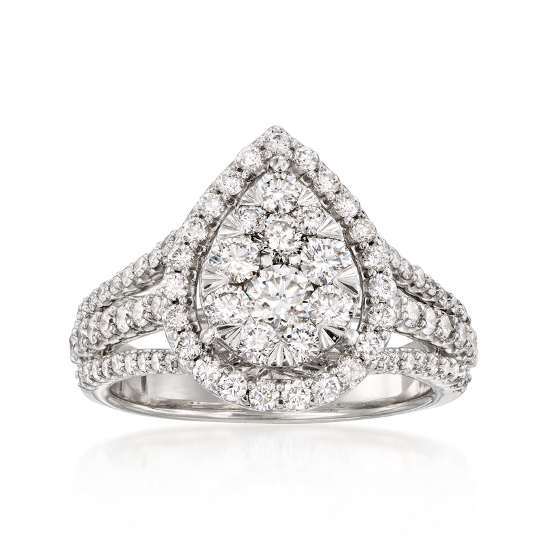 Teardrop diamond cluster ring in 14k white gold, oval center with halo