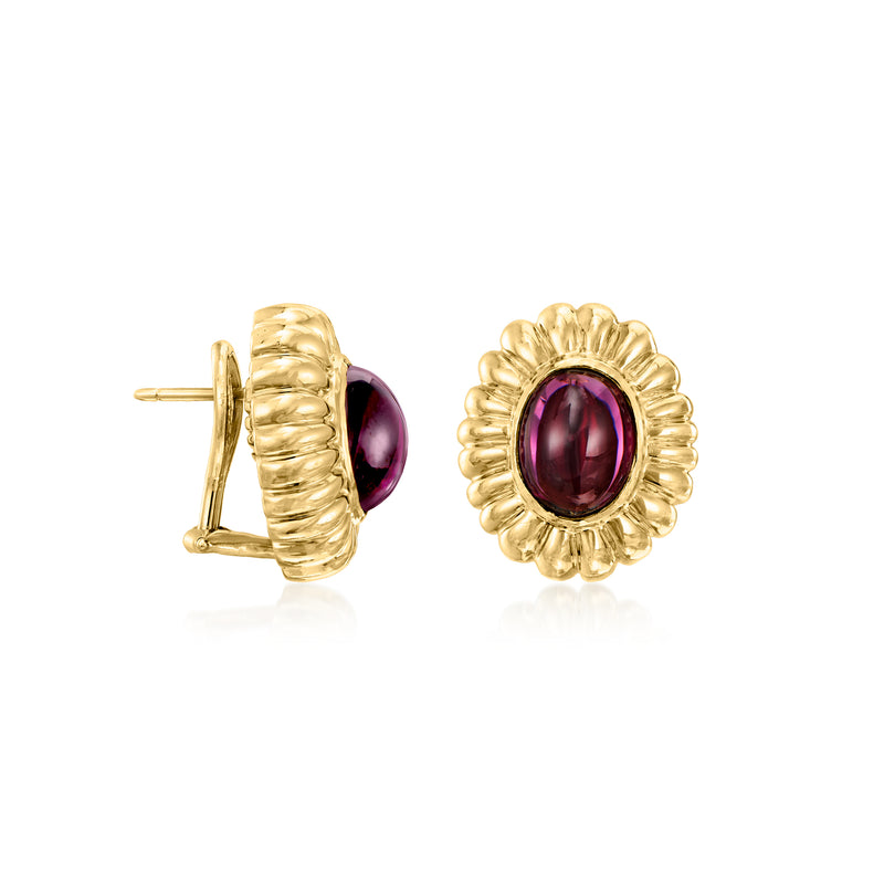 Gold post earrings with scalloped flower frames and oval purple rhodolite gems
