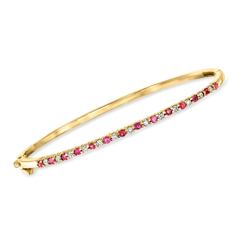 14kt yellow gold ruby and diamond bangle bracelet with pink oval gemstone row
