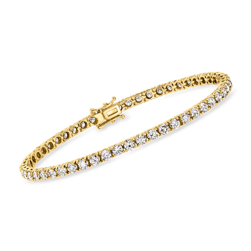Yellow gold diamond tennis bracelet with diamond row and box clasp, vintage style