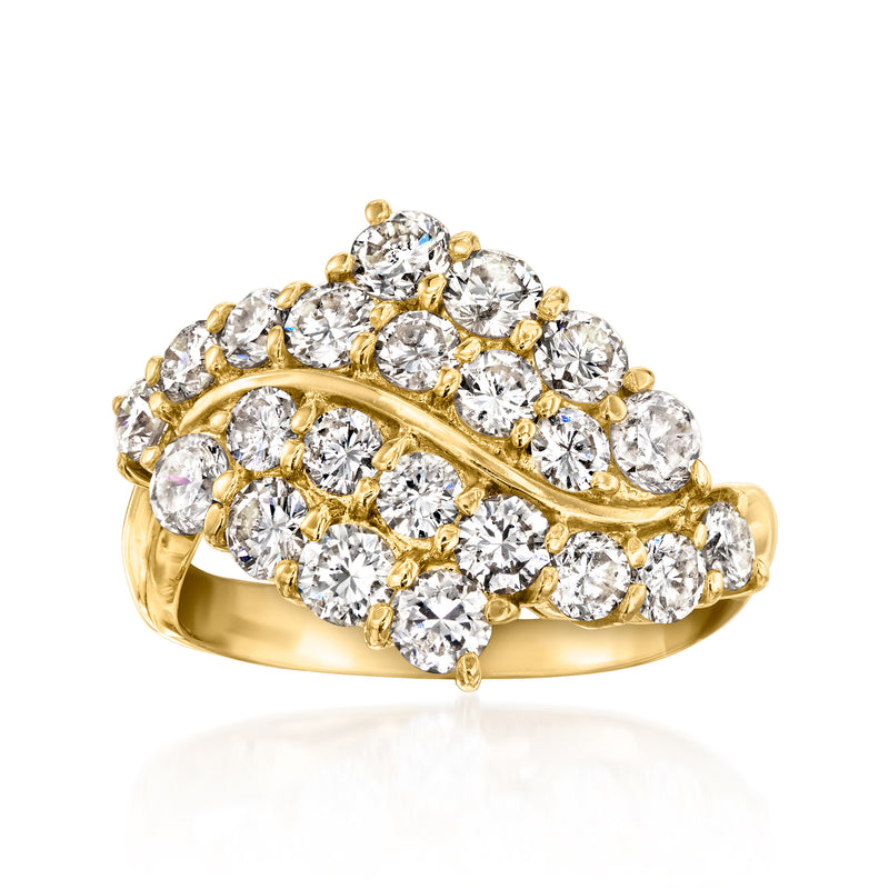 Vintage diamond cluster ring in 18kt yellow gold with round stones, raised setting