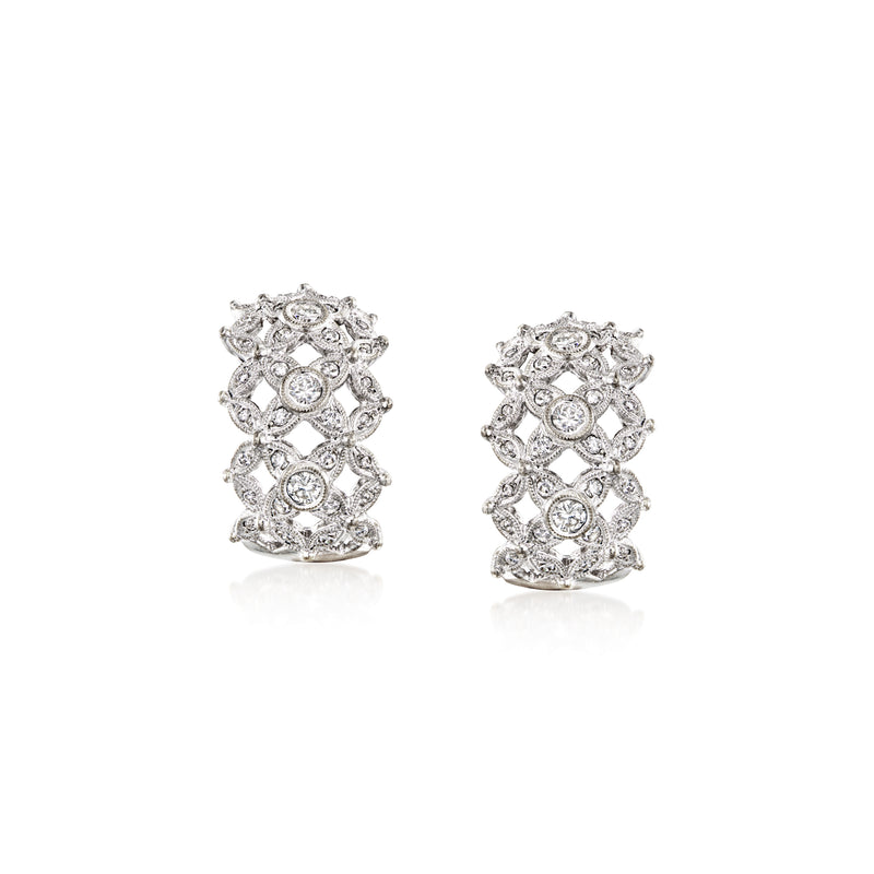 Curved white gold diamond cluster hoop earrings with multiple round-cut stones