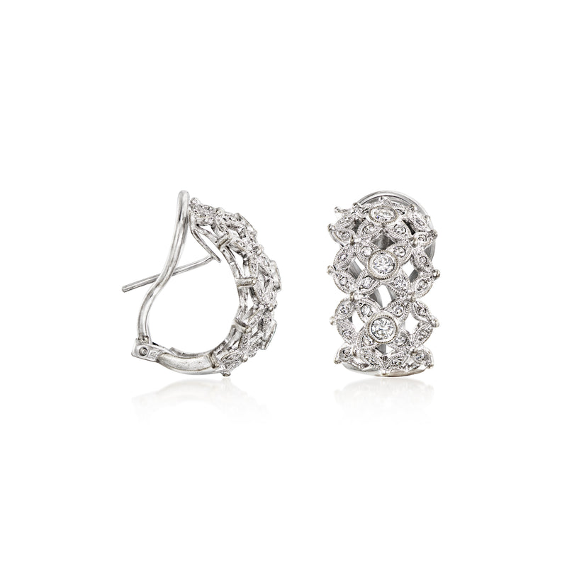 Diamond cluster hoop earrings, one shown in profile with post backing