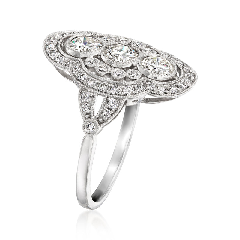 Platinum vintage diamond cluster ring side view with oval halo and prong-set stones