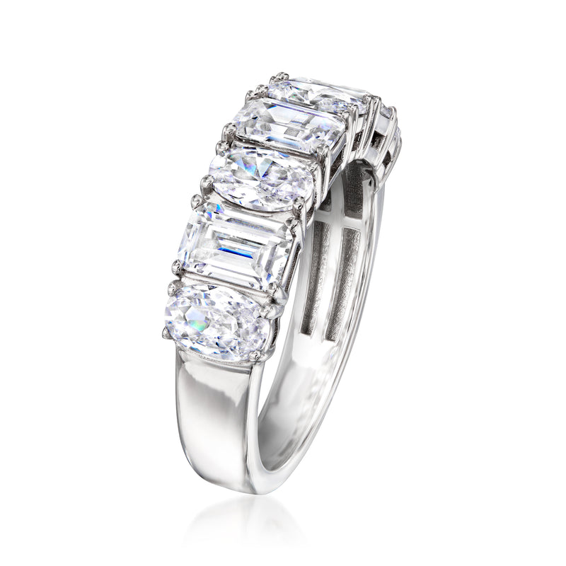 Sterling silver CZ ring with emerald-cut center and oval side stones, high prongs.