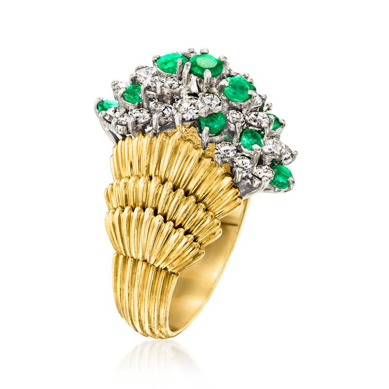Side view of 18kt yellow gold ring with green emeralds and round diamond clusters