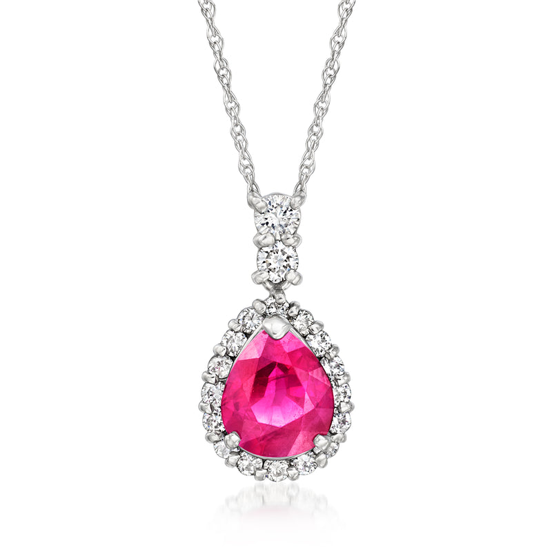 Ruby pear-drop pendant necklace with diamond halo, on fine silver chain.