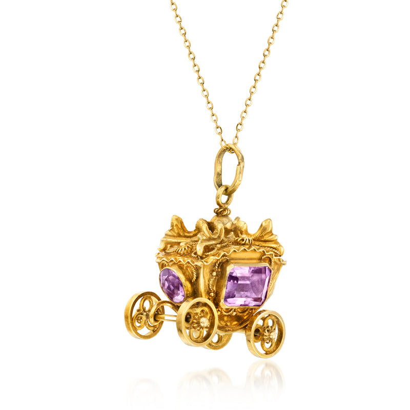 Gold amethyst carriage pendant necklace with purple gemstones and ornate carriage wheels