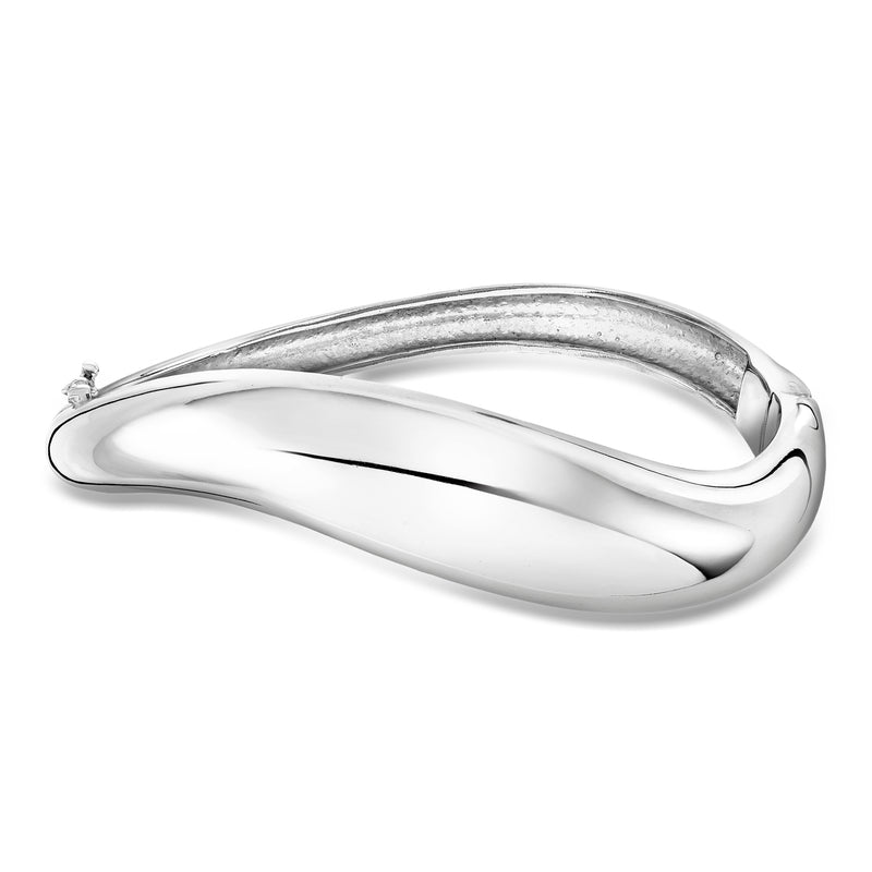 Sterling silver bangle bracelet with sculpted twisted oval and polished ridges