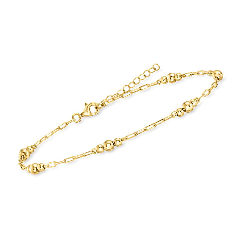 Gold over sterling bead station anklet featuring round beads and a lobster clasp