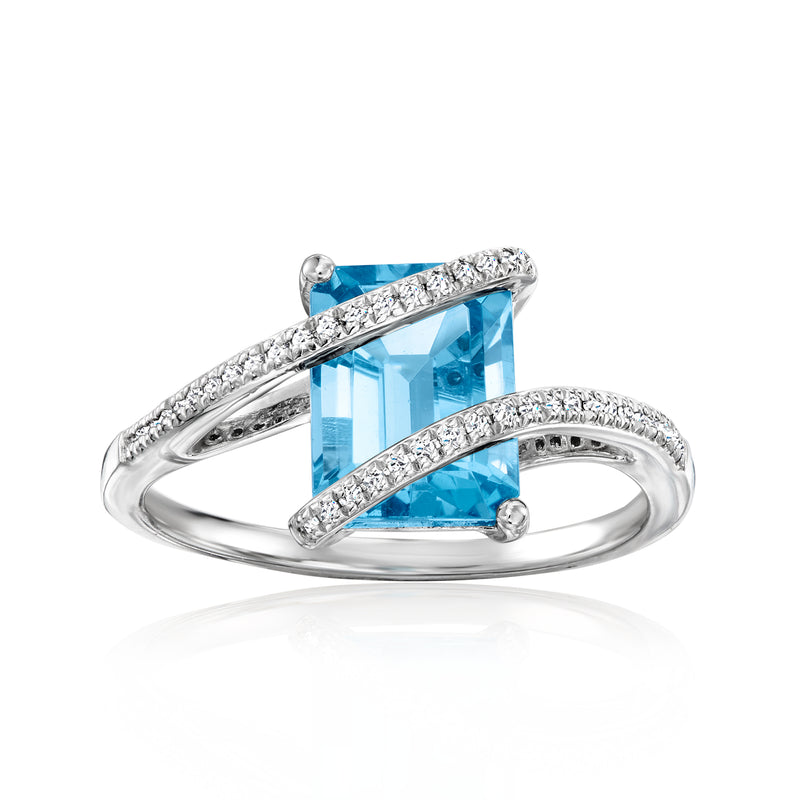 Sterling silver ring with rectangular Swiss blue topaz and pave diamond bands